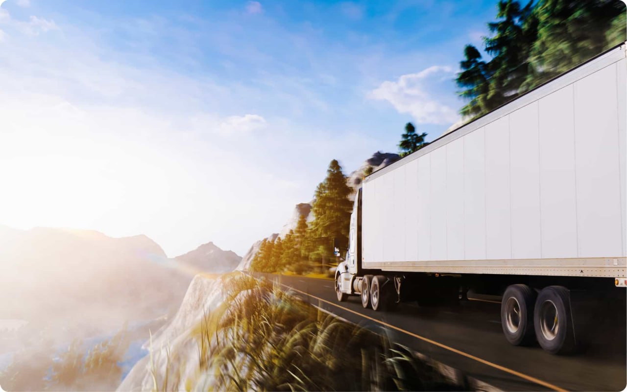 Truck on mountain road — land freight